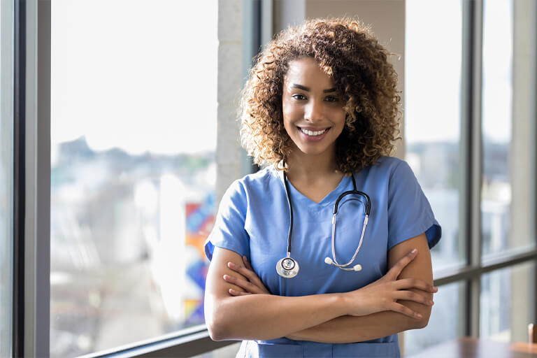 female nurse practitioner smiling